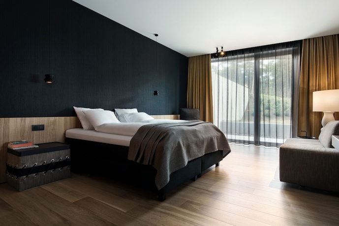 Imagen de la habitación del Hotel Domaine La Butte Aux Bois. Foto 12