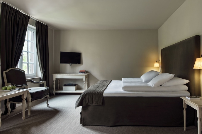 Imagen de la habitación del Hotel Domaine La Butte Aux Bois. Foto 14