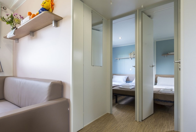 Imagen de la habitación del Hotel Domaine R&eacute;sidentiel de Plein Air Odalys Le Port de la Chaine. Foto 2