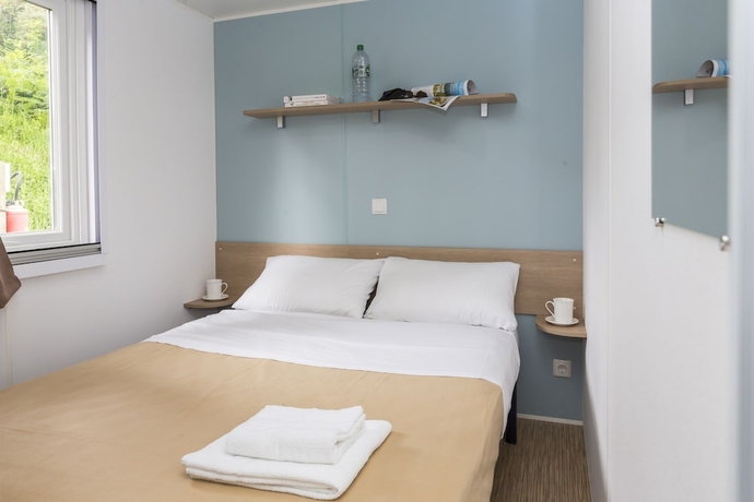 Imagen de la habitación del Hotel Domaine R&eacute;sidentiel de Plein Air Odalys Le Port de la Chaine. Foto 4