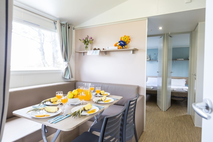 Imagen de la habitación del Hotel Domaine R&eacute;sidentiel de Plein Air Odalys Le Port de la Chaine. Foto 5