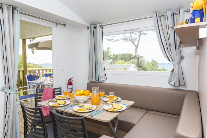 Imagen de la habitación del Hotel Domaine R&eacute;sidentiel de Plein Air Odalys Le Port de la Chaine. Foto 6