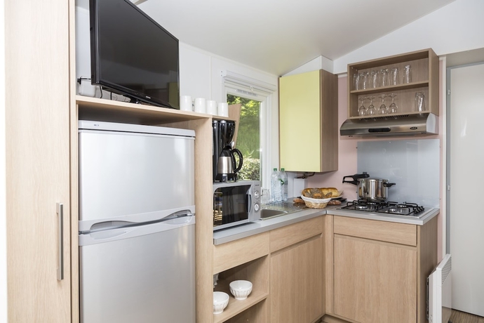 Imagen de la habitación del Hotel Domaine R&eacute;sidentiel de Plein Air Odalys Le Port de la Chaine. Foto 8