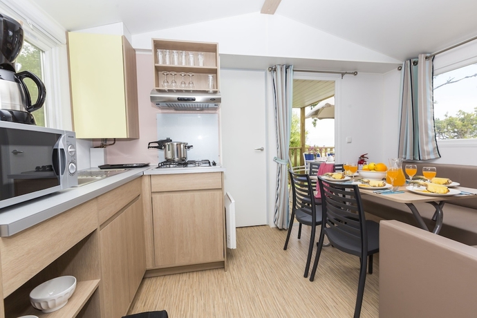 Imagen de la habitación del Hotel Domaine R&eacute;sidentiel de Plein Air Odalys Le Port de la Chaine. Foto 9