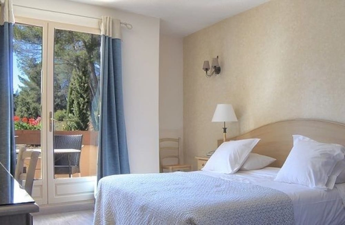 Imagen de la habitación del Hotel Domaine de l'Oustalia. Foto 6