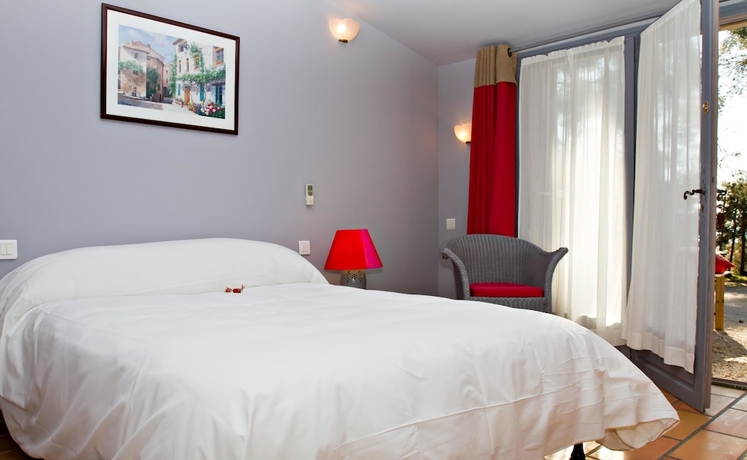 Imagen de la habitación del Hotel Domaine de l'Oustalia. Foto 11