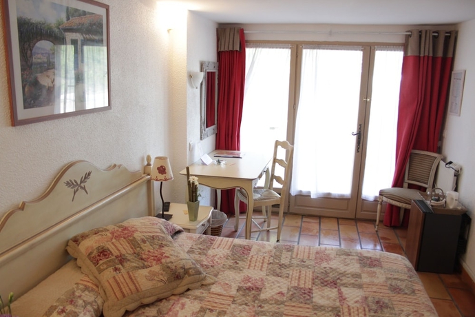 Imagen de la habitación del Hotel Domaine de l'Oustalia. Foto 13