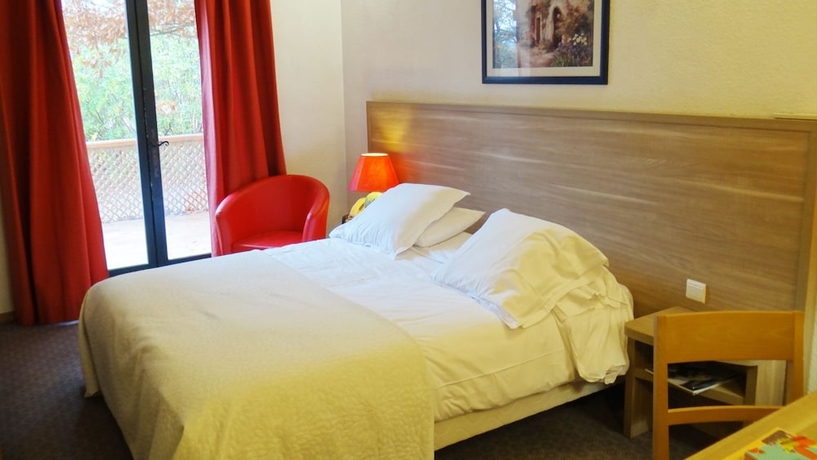 Imagen de la habitación del Hotel Domaine de l'Oustalia. Foto 18