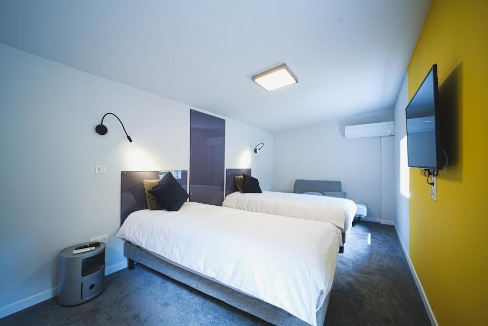 Imagen de la habitación del Hotel Domaine de la Résidence. Foto 5