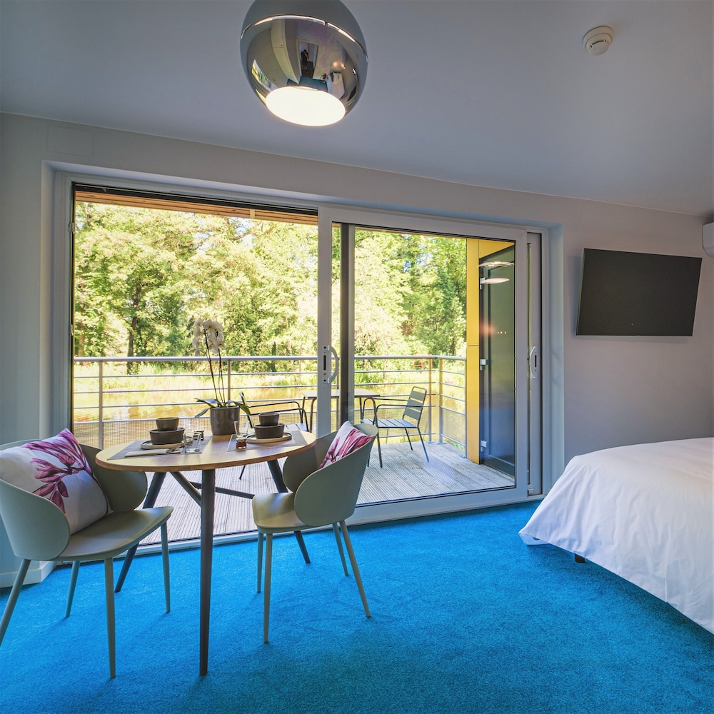 Imagen de la habitación del Hotel Domaine de la Résidence. Foto 9