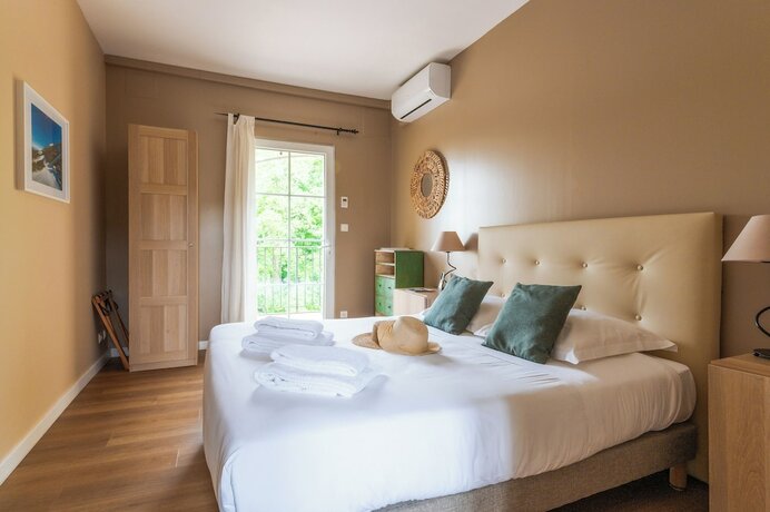 Imagen de la habitación del Hotel Domaine des Tilleuls. Foto 18