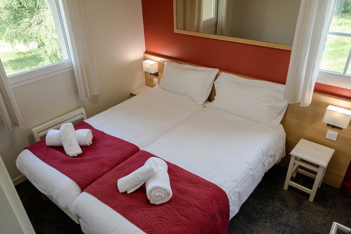 Imagen de la habitación del Hotel Domaine du Golf Country Club de Bigorre. Foto 12