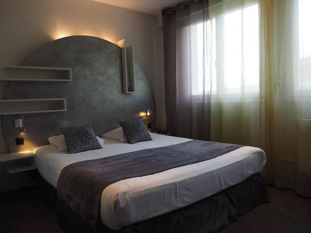 Imagen de la habitación del Hotel Domaine du Revermont. Foto 9