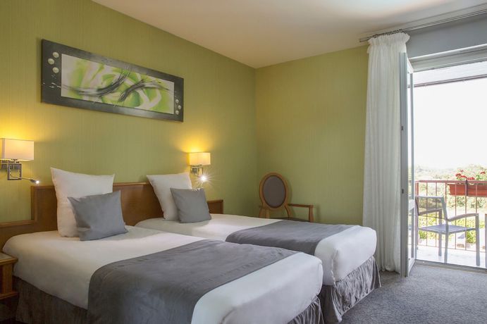 Imagen de la habitación del Hotel Domaine du Revermont. Foto 16