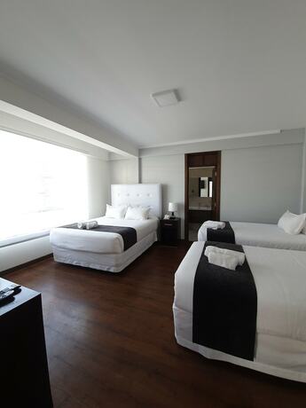 Imagen de la habitación del Hotel Domani Boutique. Foto 10