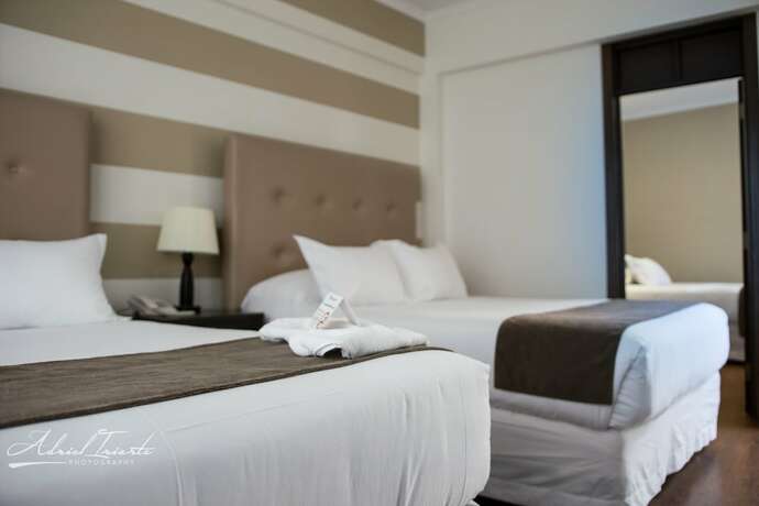 Imagen de la habitación del Hotel Domani Boutique. Foto 11