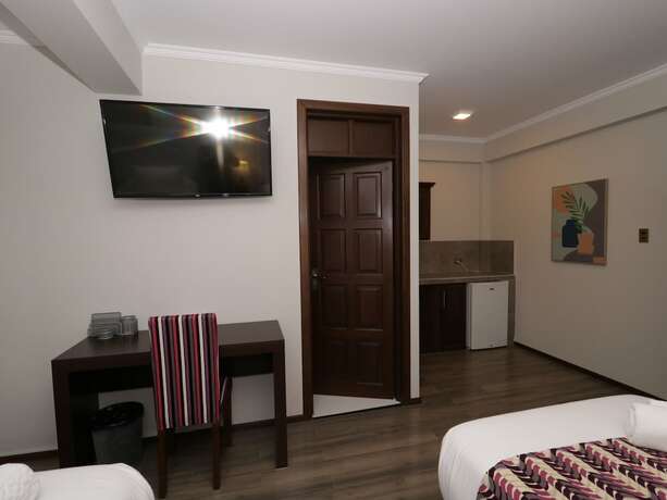 Imagen de la habitación del Hotel Domani Boutique. Foto 12