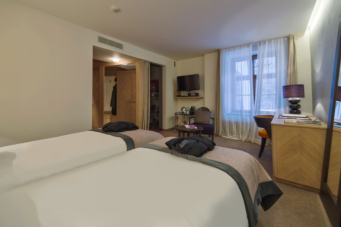 Imagen de la habitación del Hotel Dome, Riga. Foto 13