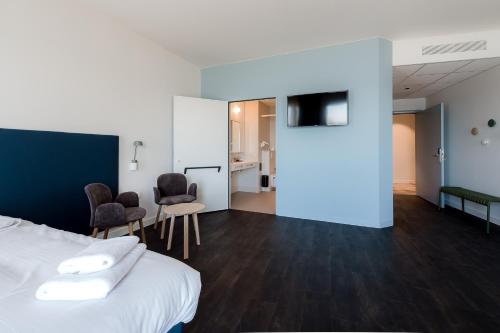 Imagen de la habitación del Hotel Domein Polderwind. Foto 18