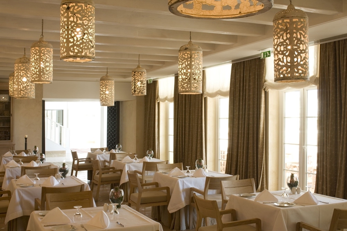 Imagen del bar/restaurante del Hotel Domes Lake Algarve and Residences. Foto 2