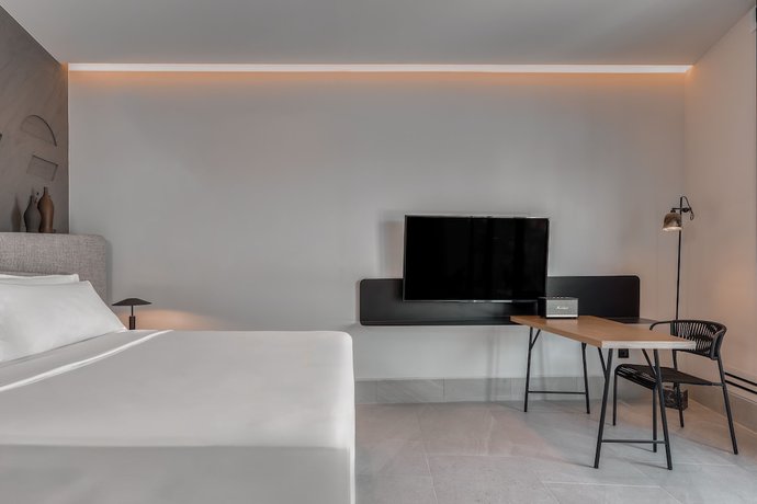 Imagen de la habitación del Hotel Domes Novos Santorini. Foto 19