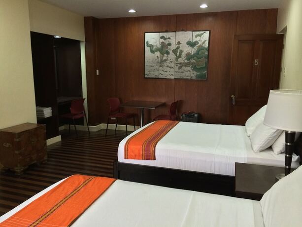 Imagen de la habitación del Hotel Domicilio Lorenzo. Foto 21