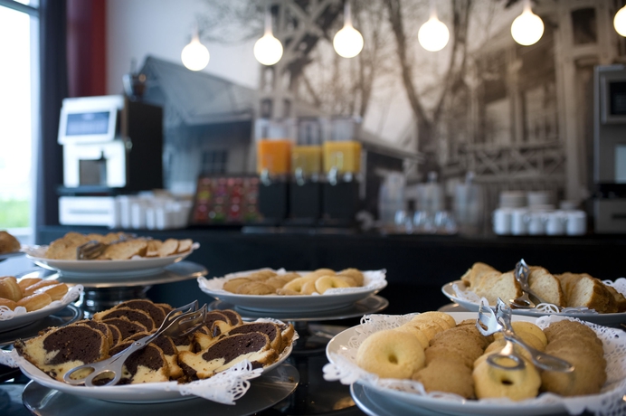 Imagen del bar/restaurante del Hotel Domina Milano Fiera. Foto 6