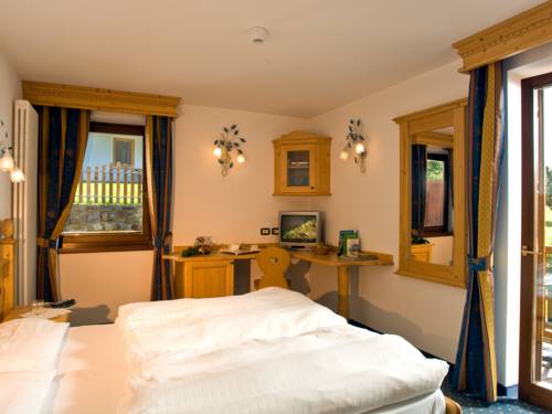 Imagen de la habitación del Hotel Domina Parco Dello Stelvio. Foto 4