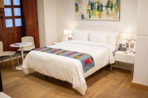 Imagen de la habitación del Hotel Domingo Santo Boutique. Foto 5