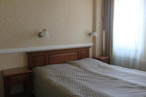 Imagen de la habitación del Hotel Dominika. Foto 16