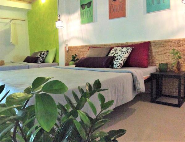 Imagen de la habitación del Hotel Domino Homestay. Foto 2