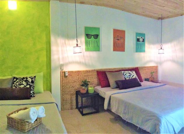 Imagen de la habitación del Hotel Domino Homestay. Foto 4