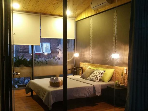 Imagen de la habitación del Hotel Domino Homestay. Foto 7