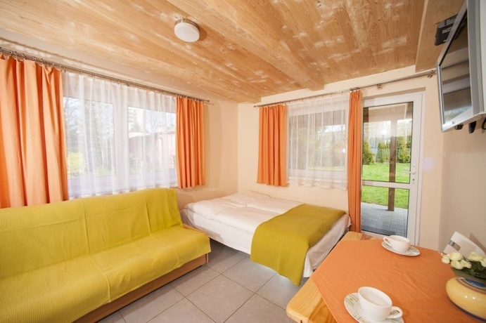 Imagen de la habitación del Hotel Domki Całoroczne Ajna Park. Foto 4