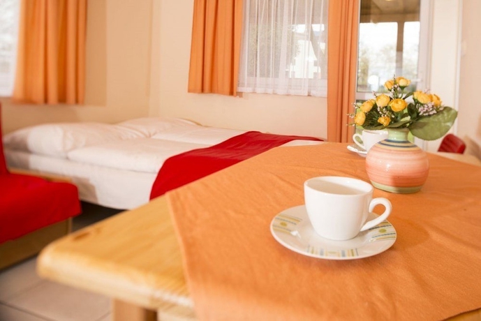 Imagen de la habitación del Hotel Domki Całoroczne Ajna Park. Foto 7