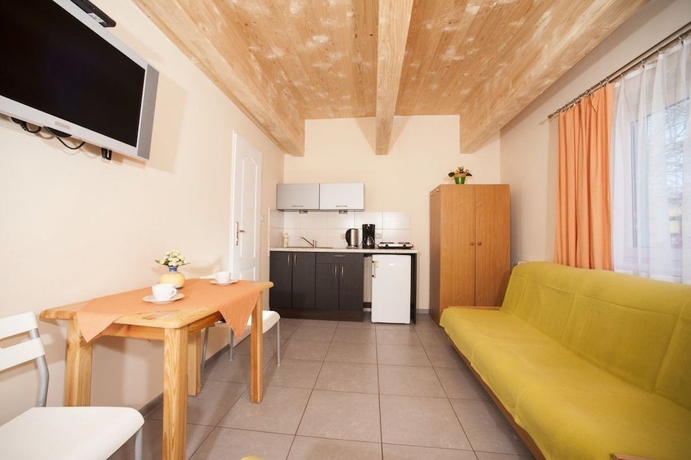 Imagen de la habitación del Hotel Domki Całoroczne Ajna Park. Foto 11