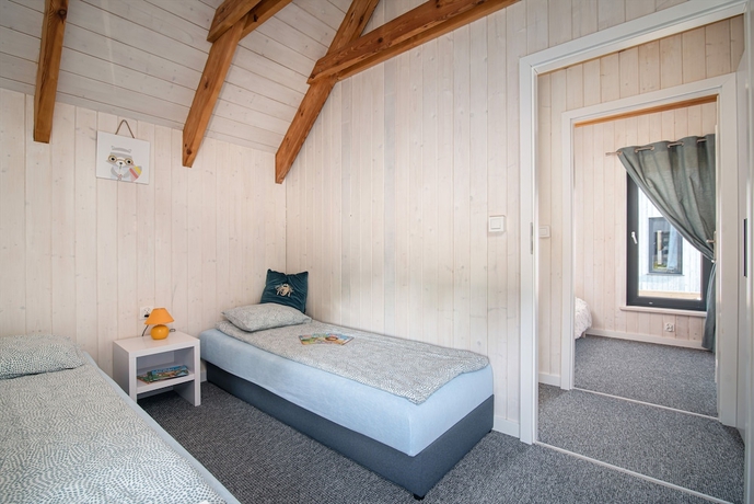 Imagen de la habitación del Hotel Domki Fantazja Dębki. Foto 7