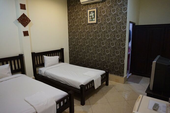 Imagen de la habitación del Hotel Domon. Foto 19