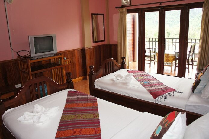 Imagen de la habitación del Hotel Domon Guesthouse. Foto 18