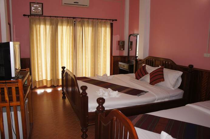 Imagen de la habitación del Hotel Domon Guesthouse. Foto 22
