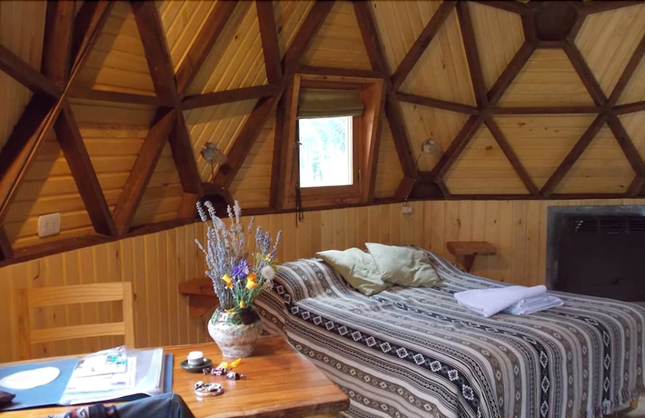 Imagen de la habitación del Hotel Domos Puelo. Foto 9