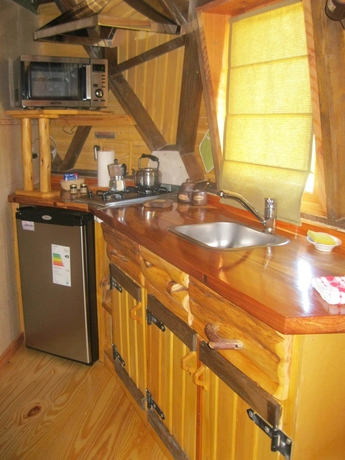 Imagen de la habitación del Hotel Domos Puelo. Foto 14