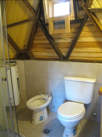 Imagen de la habitación del Hotel Domos Puelo. Foto 15