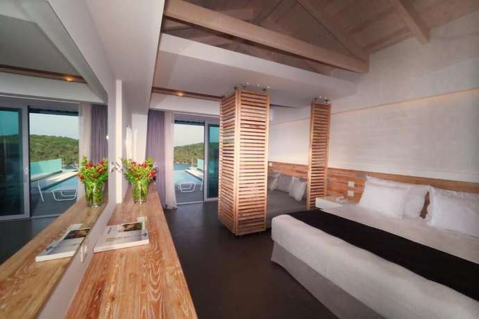 Imagen de la habitación del Hotel Domotel Agios Nikolaos Suites Resort. Foto 10