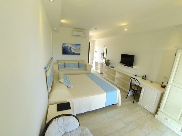 Imagen de la habitación del Hotel Domus De Janas Sul Mare. Foto 4