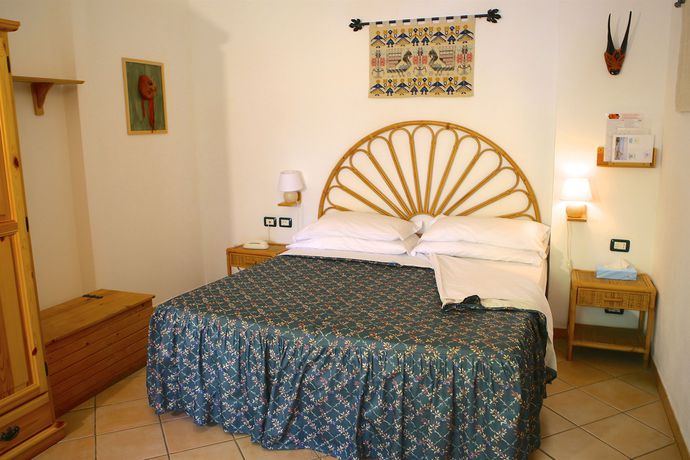 Imagen de la habitación del Hotel Domus De Janas Sul Mare. Foto 5