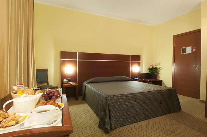 Imagen de la habitación del Hotel Domus Expo. Foto 12