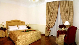 Imagen de la habitación del Hotel Domus Inn. Foto 2