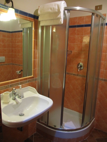 Imagen de la habitación del Hotel Domus Livia Luxury Suites. Foto 7