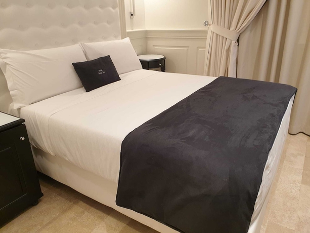 Imagen de la habitación del Hotel Domus Mea. Foto 5